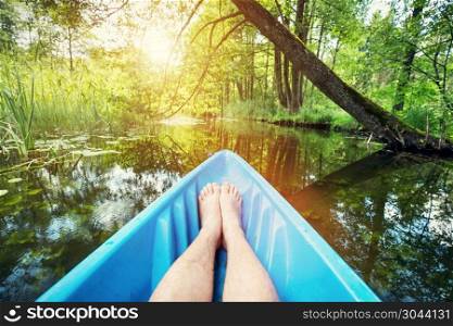 Kayaking on the river. First person perspective. Water sport, active summer vacation.. Kayaking on the river.