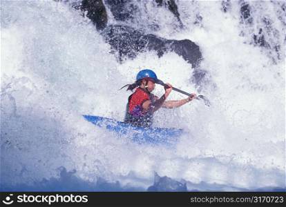 Kayaking Through Churning White Water