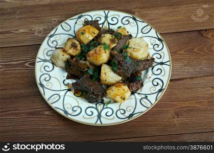 kazan-kabob - fried meat and potatoes .Central Asian cuisine