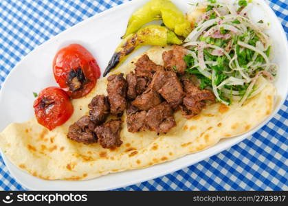 Kebab served in the plate