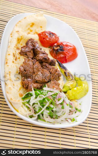 Kebab served in the plate