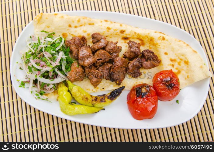 Kebab served in the plate