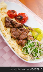 Kebab served in the plate