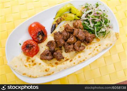Kebab served in the plate