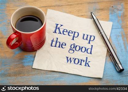 Keep up the good work - motivational handwriting on a napkin with a cup of espresso coffee