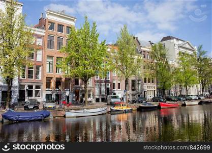 Keizersgracht canal historic architecture in Amsterdam, Netherlands.