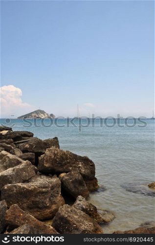 Keri beach summer landscape distant sailboats and island. Zakynthos, Greece.