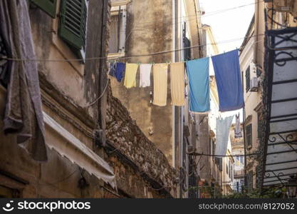 KERKYRA, CORFU, GREECE - JULE 10, 2021   small narrow streets of historic Center old town of Kerkyra 