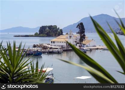KERKYRA, CORFU, GREECE - JULE 11, 2021   view of Vlacherna Monastery Kanoni and Mouse islands 