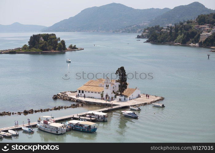 KERKYRA, CORFU, GREECE - JULE 11, 2021   view of Vlacherna Monastery Kanoni and Mouse islands 