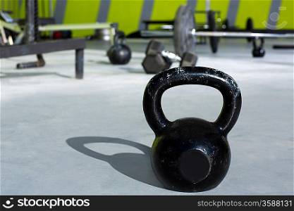 Kettlebell at crossfit gym with lifting bars in background
