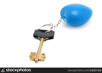 key and trinket isolated on a white background