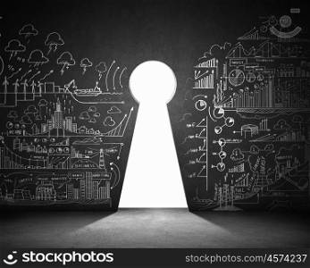 Key hole background. Business plan sketch on black wall with key hole