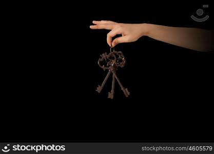 Key to success. Close up of woman hand holding golden key