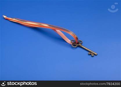Key To Success isolated on blue background