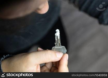 Key used For Taking Bumps Of Drugs, snorting cocaine or speed addiction concept close-up. Key used For Taking Bumps Of Drugs, snorting cocaine or speed addiction concept