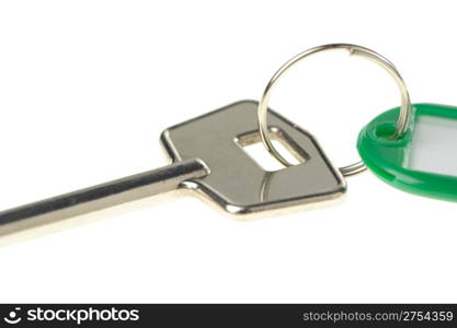 Key with color trinket . In trinket a white empty label for records