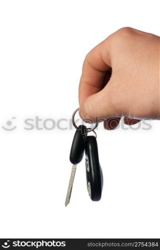 Keys from the car with signalling. The isolated sheaf of keys from the car in a hand