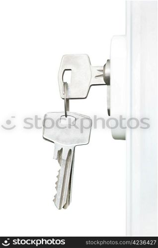 Keys in door lock, isolated on white