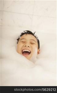 Kid Covered in Bubbles in Bubble Bath