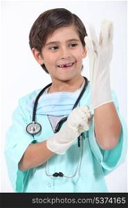 Kid dressed as surgeon
