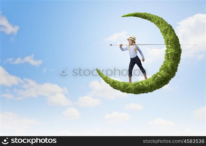 Kid fisherman. Cute girl standing on green moon with fishing rod