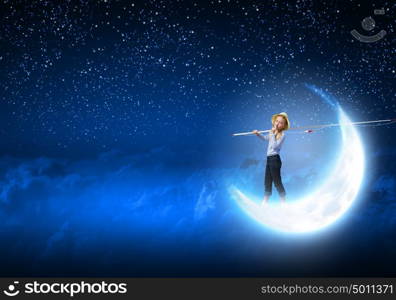 Kid fisherman. Cute girl standing on moon with fishing rod