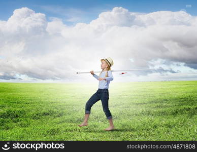 Kid fisherman. Cute girl with fishing rod on shoulder