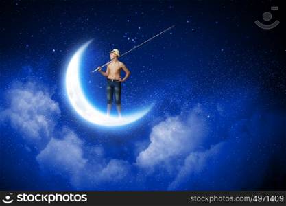 Kid fisherman. Young boy standing on moon with fishing rod
