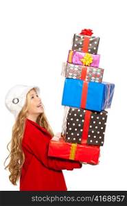 kid girl holding many gifts stacked on her hand isolated on white