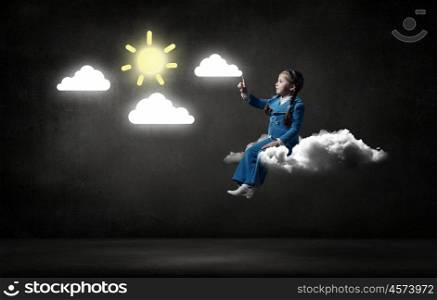 Kid girl on cloud. Little cute girl sitting on cloud and pointing with finger