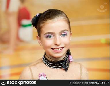 kid girl rhythmic gymnastics on wooden deck portrait