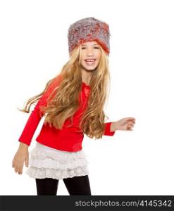 kid girl winter dancing with red shirt and fur hat on white background