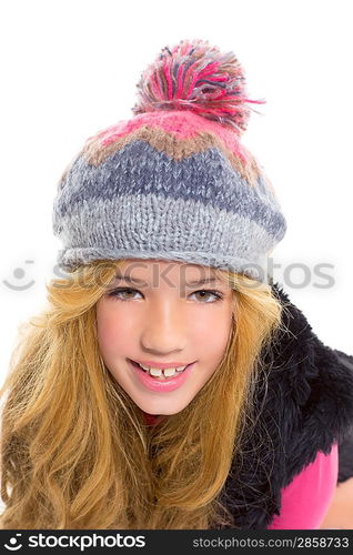 Kid girl with winter wool cap happy smiling on white background