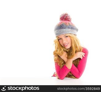 Kid girl with winter wool cap happy smiling on white background
