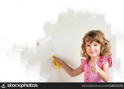 Kid painting wall with pink color. Renovation concept