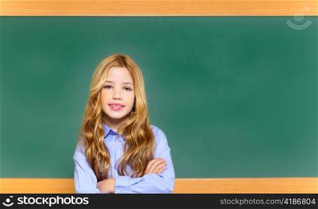 kid student girl on green blackboard posing with smile