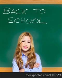 kid student girl on green school blackboard with written back to school text