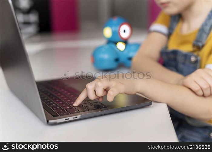 kid typing keyboard