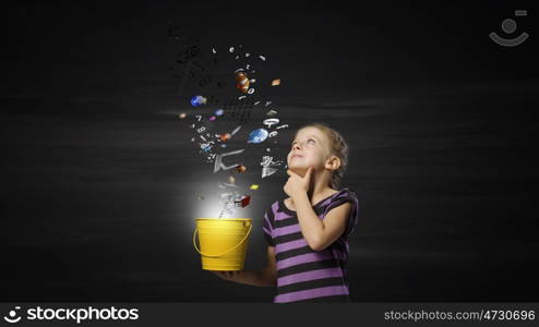 Kid with bucket. Cute girl with bucket splashing conceptual items