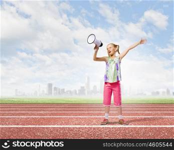 Kid with megaphone. Image of little girl shouting into megaphone