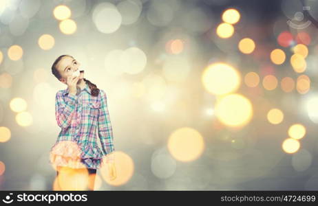 Kid with mustache. Cute girl wearing shirt and paper mustache