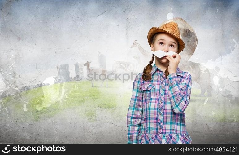 Kid with mustache. Cute girl wearing shirt hat and mustache