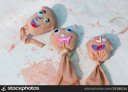 kids artwork of faces with seeds that will grow grass as hair