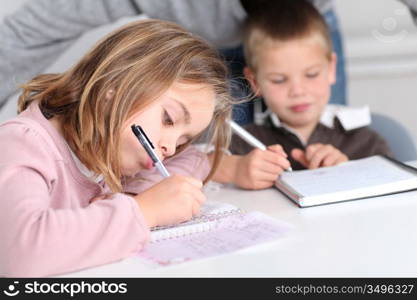 Kids at school doing their homework