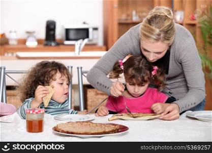 kids eating pancakes for breakfast