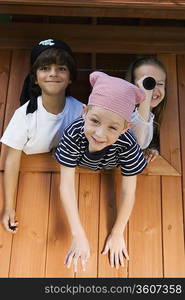 Kids Playing in Playhouse