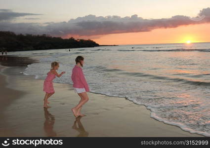 Kids playing on beach - Hawaii