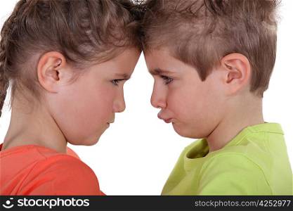 Kids pouting face to face
