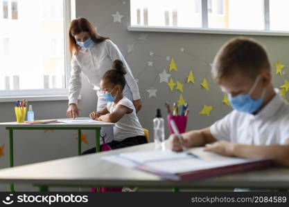 kids teacher wearing medical masks